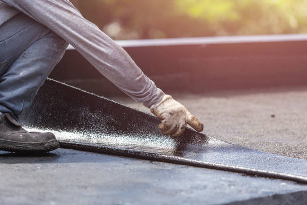 Professional Waterproofing technician working in Arlington, MN